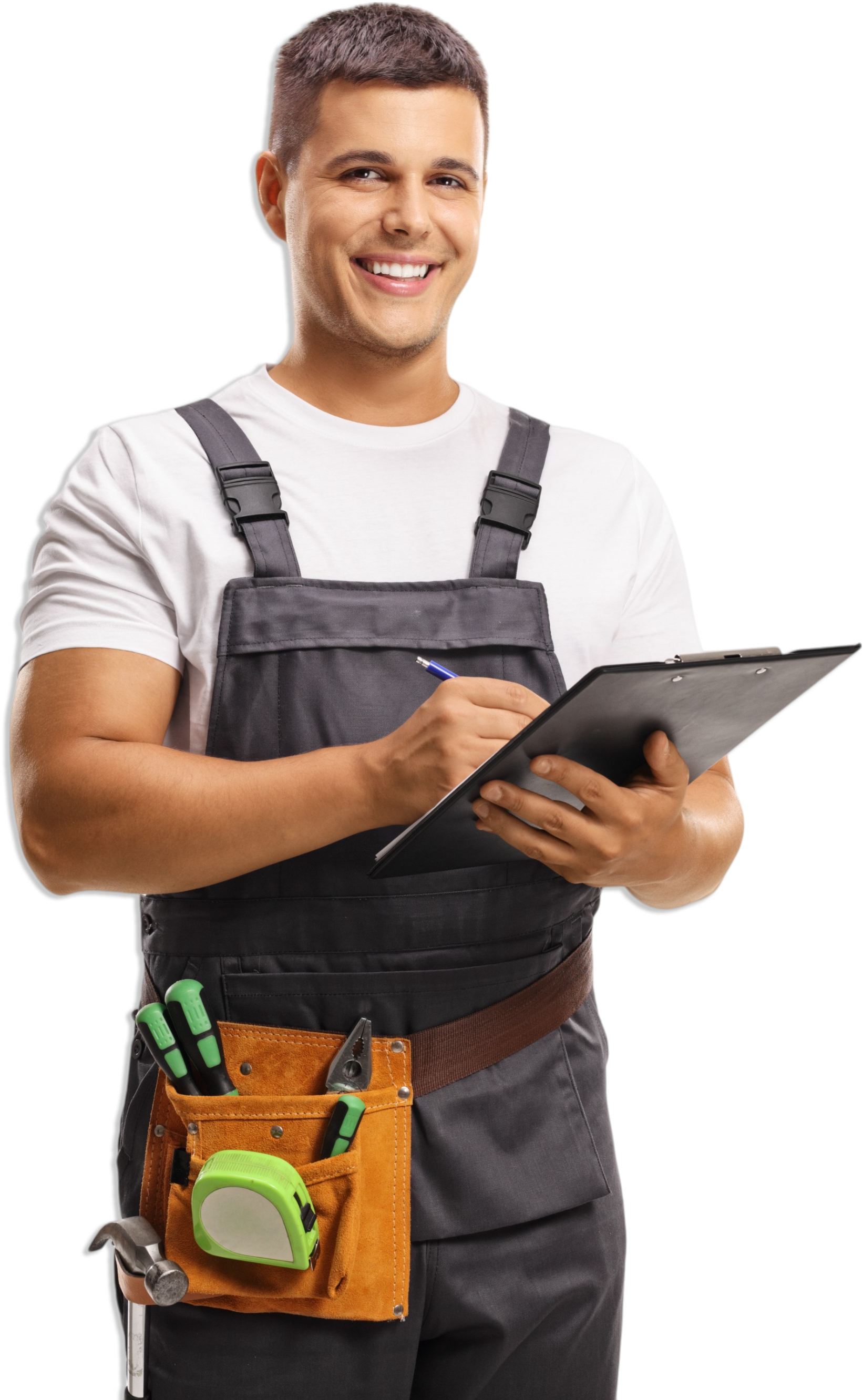 A man in overalls is holding a clipboard and smiling.